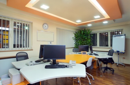 Interior of an office, modern and simple furniture and lighting equipment.