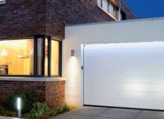 Секционные или рулонные ворота: что выбрать для гаража?